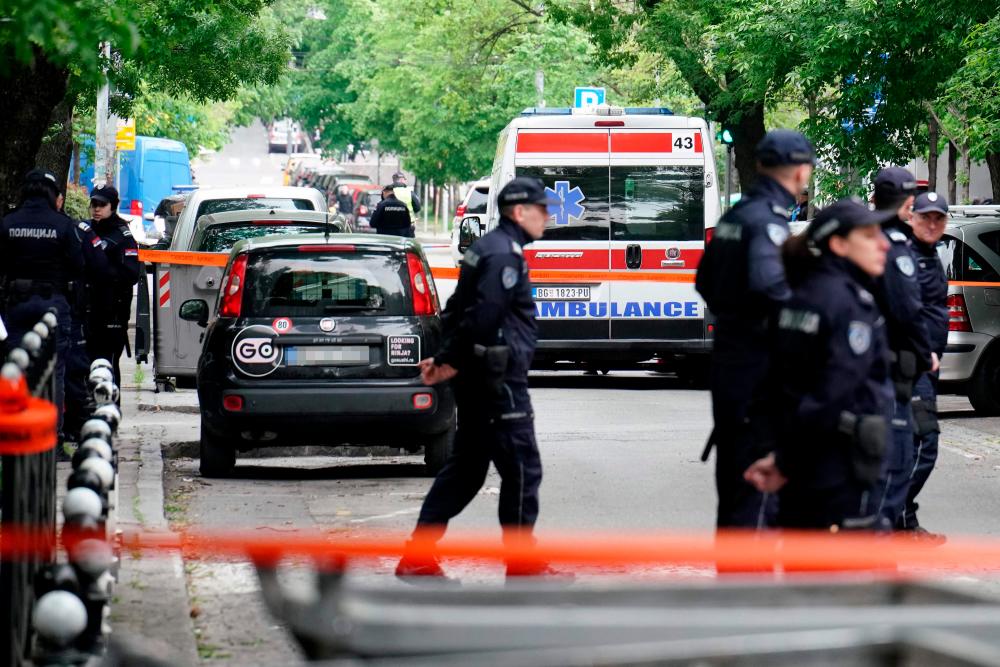 Ambulances and police officers arrive following a shooting at a school in the capital Belgrade on May 3, 2023/AFPPix