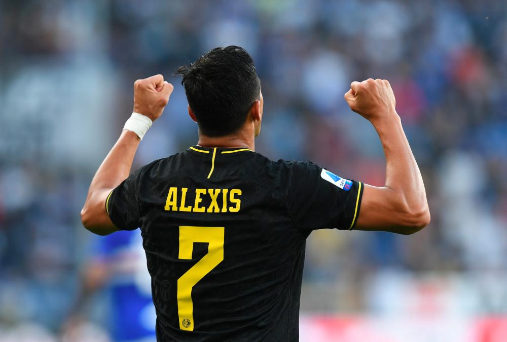 Inter Milan's Alexis Sanchez celebrates scoring their first goal. - Reuters