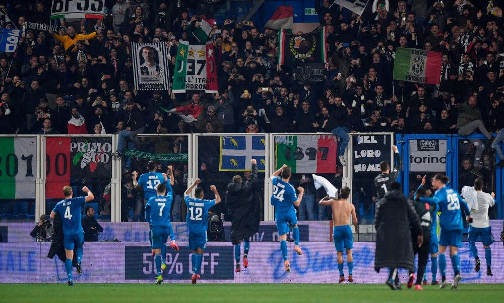 Juventus players celebrate after the match on February 22, 2020. - Reuters