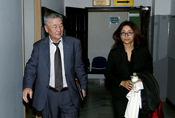 Shaariibuu Setev, father of Altantuya and his lawyer, Sangeet Kaur Deo at the Shah Alam High Court for the civil lawsuit against the Malaysian government and others on Jan 28, 2019. — BBXpress