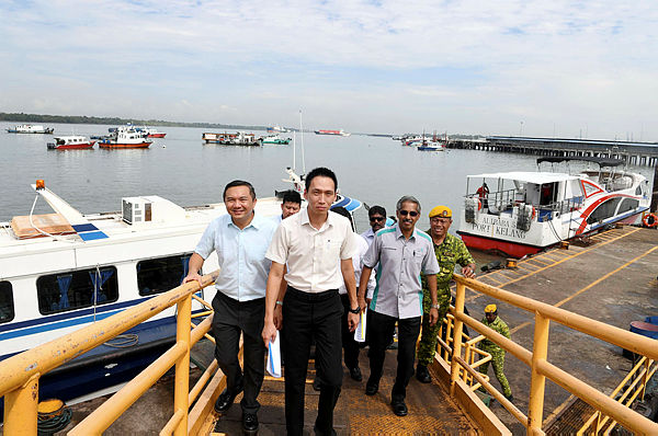 Filepix taken on June 14 shows Port Klang Authority (PKA) chairman Ean Yong Hian Wah (centre) visiting the South Port Passenger Terminal.