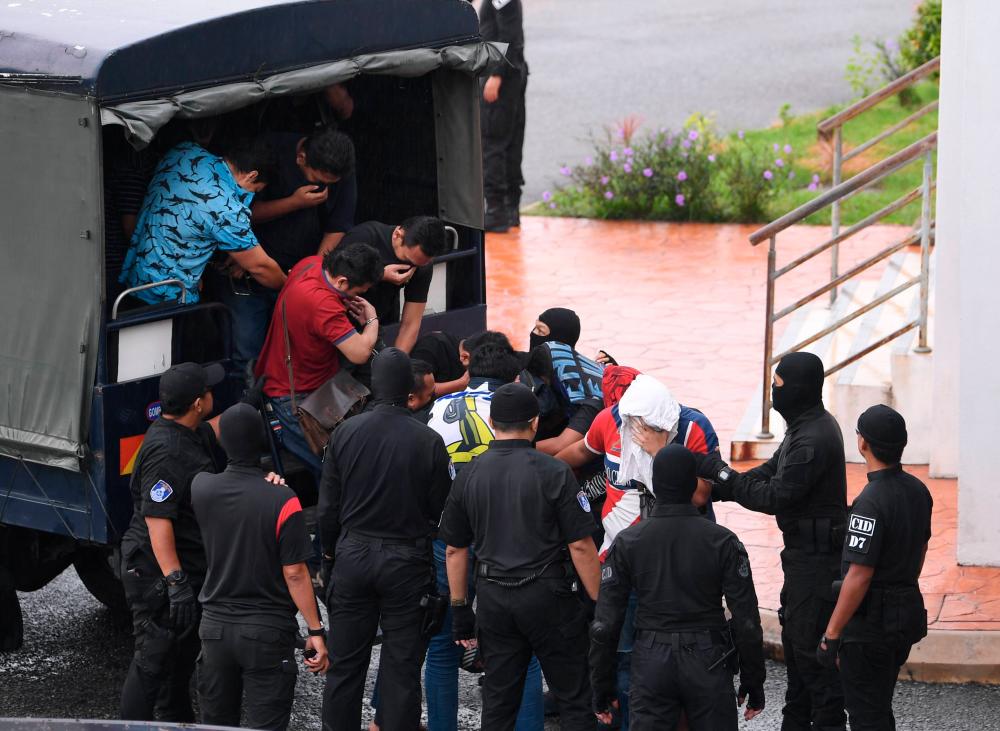 The leader of the organized crime group ‘AYT 99’ Masyre Mohamed Narizan, 39, and 11 other members of the group were charged in the Klang sessions court today. - Bernama