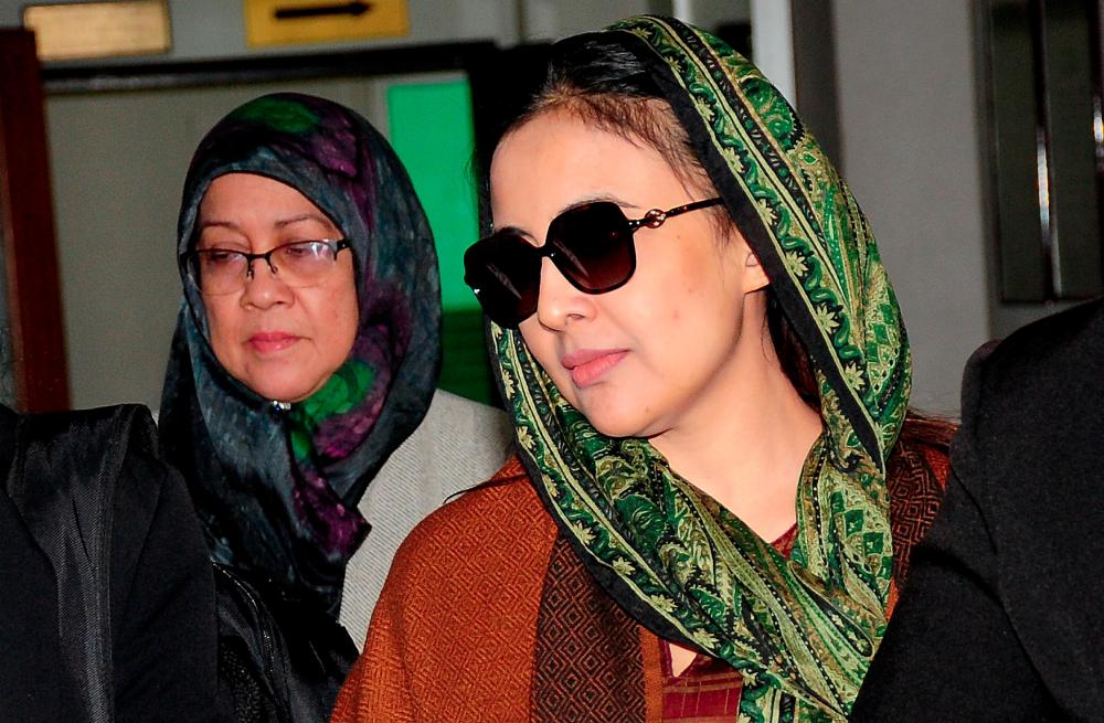 Samirah Muzaffar yang didakwa atas tuduhan membunuh suaminya, Ketua Pegawai Eksekutif Cradle Fund, Nazrin Hassan hadir pada prosiding perbicaraan di Mahkamah Tinggi pada 20 Sept, 2019. — Bernama