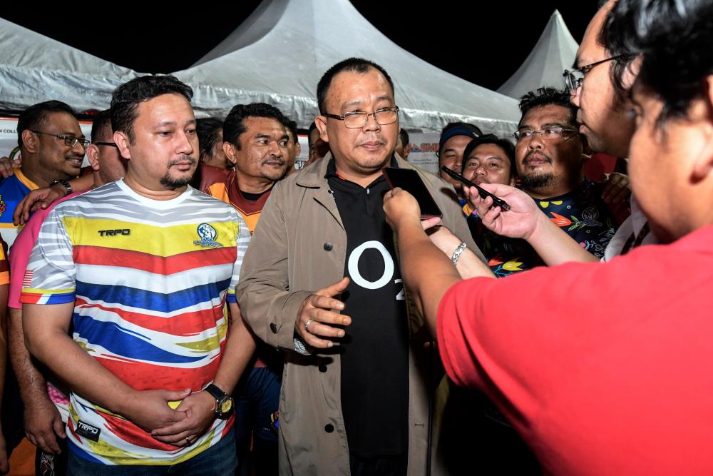 Deputy Minister of Communications and Multimedia Eddin Syazlee Shith speaks to the media after the Home of Warriors Rugby Club championship, on Aug 31, 2019. — Bernama