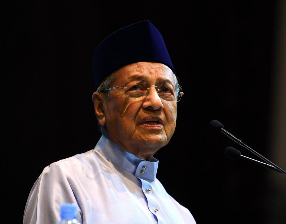 Prime Minister Tun Dr Mahathir Mohamad gives a speech at the Malay Dignity Congress at Stadium Malawati in Shah Alam. – Bernama
