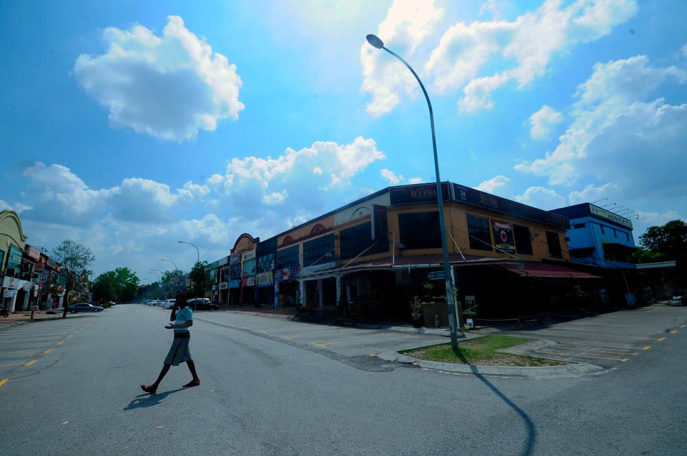 The atmosphere in the normally crowded Section 7 commercial center is now empty with the implementation of the Movement Control Order that runs today until March 31, 2020 as a measure to curb the spread of Covid-19 outbreak in the country. - Bernama