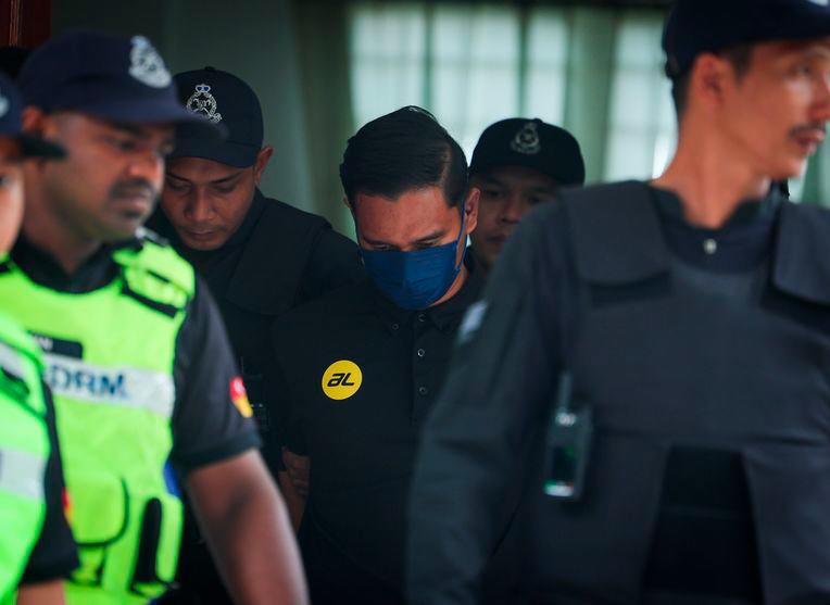 A police officer was charged in the Kuala Kubu Bharu Magistrate's Court today with the murder of Nur Farah Kartini Abdullah, whose body was found in a palm oil plantation. - BERNAMAPIX