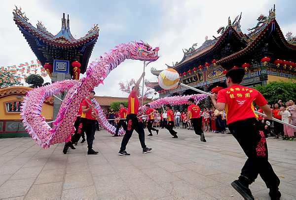 A dragon dance group performs for Chinese New Year at the Kuan Yin Temple in Klang today. — Bernama