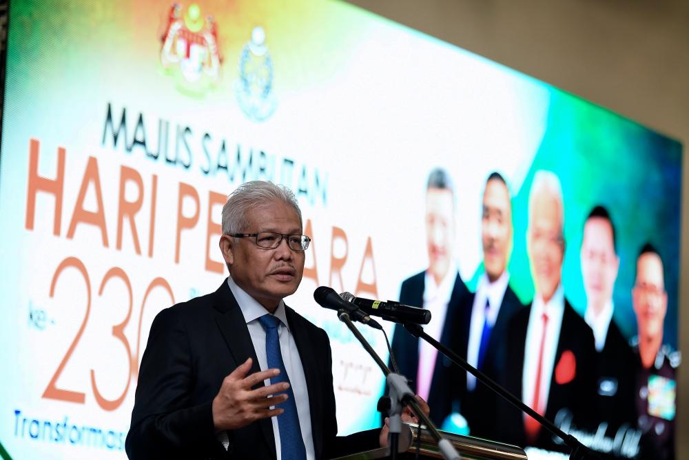 Home Minister Datuk Seri Hamzah Zainudin talks during 230th Prison Day celebration at the Kajang Prison Headquarters today. — Bernama