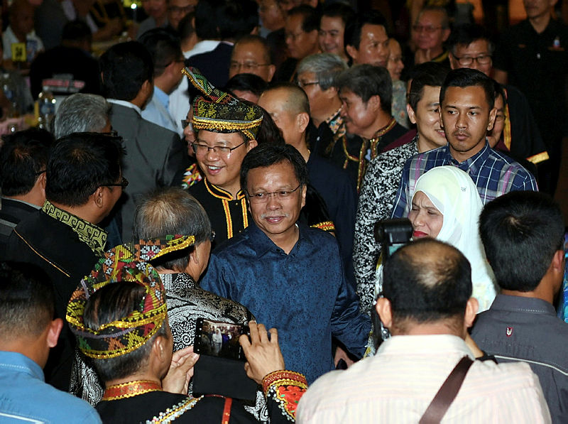 Sabah Chief Minister Datuk Seri Mohd Shafie Apdal is greeted by guests upon arrival for the United Pasokmomogun Kadazandusun Murut Organisation (Upko) anniversary dinner, on Aug 8, 2019. — Bernama