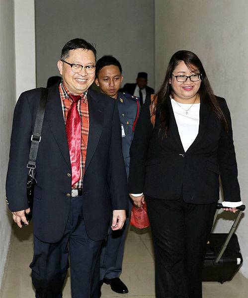 Retired Universiti Kebangsaan Malaysia (UKM) forensic pathology professor Dr Shahrom Abd Wahid (L) arrives at the inquest into the death of firefighter Muhammad Adib Mohd Kassim at the Shah Alam Court Complex on April 17, 2019. — BBXpress