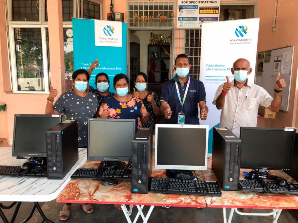 Tokio Marine presents desktop units to Shan Children’s Home