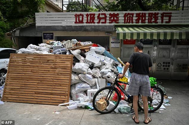 Every day, Shanghai produces around 26,000 tonnes of garbage – equal in weight to the Statue of Liberty. — AFP
