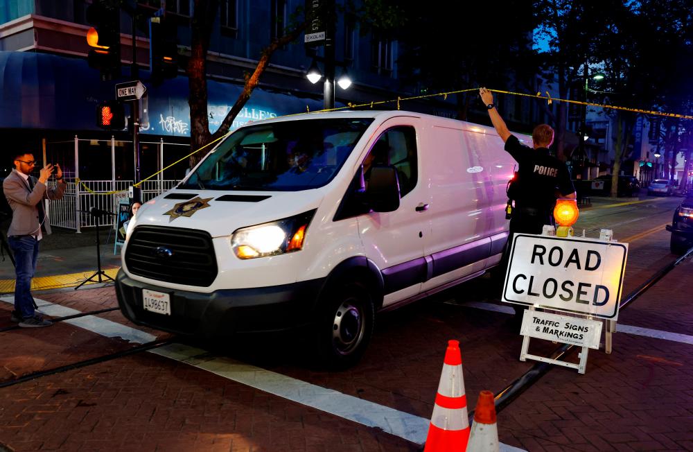 A coroner's van leaves the scene of an early-morning shooting in a stretch of downtown near the Golden 1 Center arena in Sacramento, California/REUTERSPix