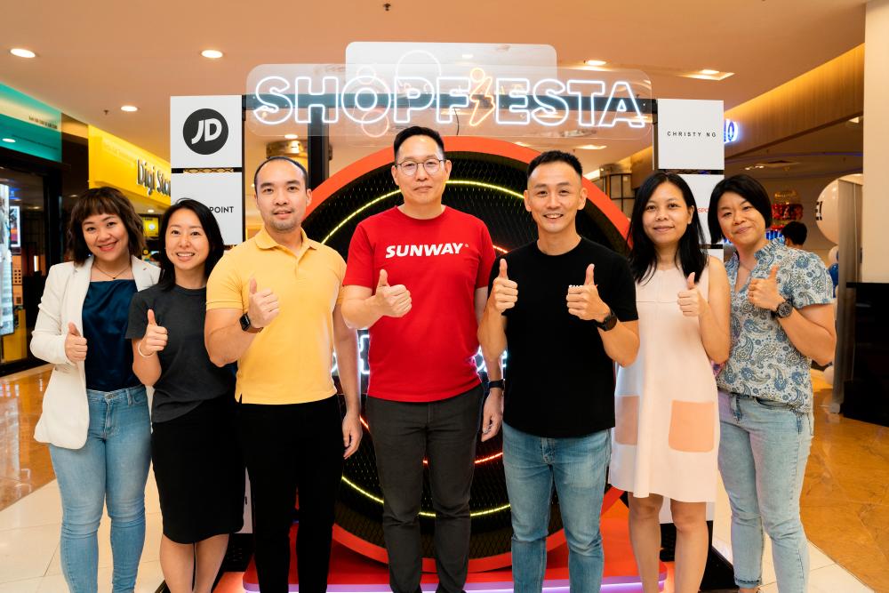 From left: Aster Spring marketing manager Melissa Ng, XiXiLi chief marketing officer Tara Tan, Transmarco Group marketing manager Daniel Ng, Sunway Pyramid general manager Jason Chin, ShopBack Malaysia general manager Eddy Han, Stream Empire marketing managers Queenie Wong and Susan Low at the ShopFiesta by ShopBack and Sunway Pyramid.