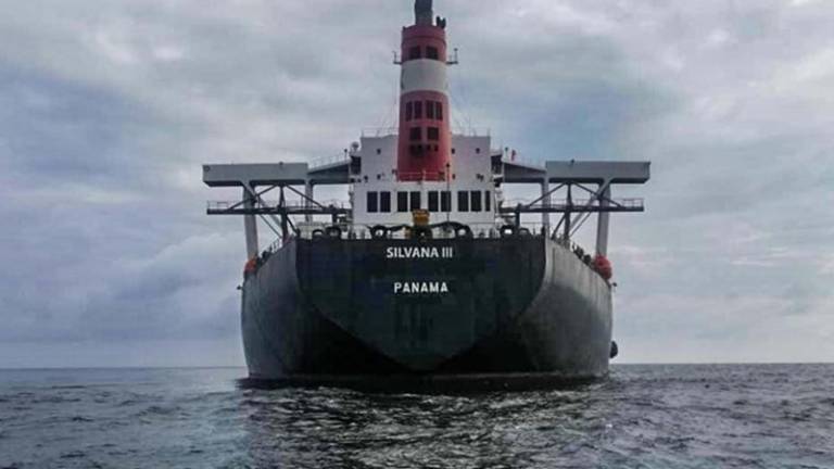 The Malaysian Maritime Enforcement Agency (MMEA) says the Silvana III, which anchored off Kuala Kurau, Perak, on Dec 5, did not follow instructions to drop its ladder to allow officers to conduct checks. — MMEA