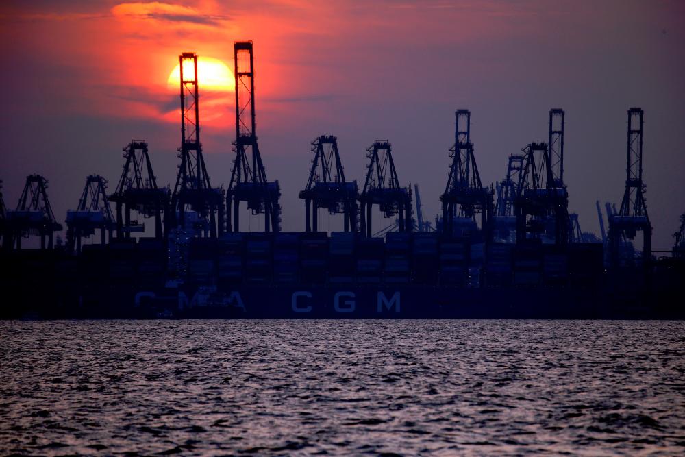 Container cranes are pictured at the port of Singapore. – REUTERSPIX