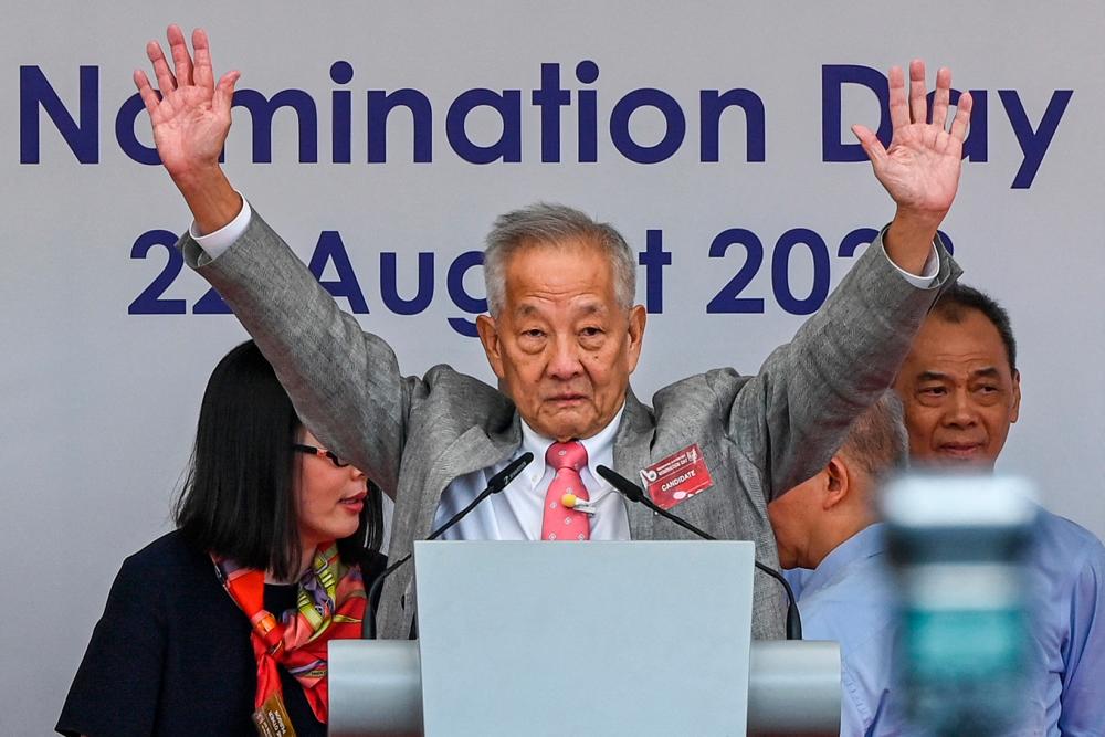 Presidential candidate Ng Kok Song waves after a speech at the nomination centre for the presidential election in Singapore on August 22, 2023. AFPPIX