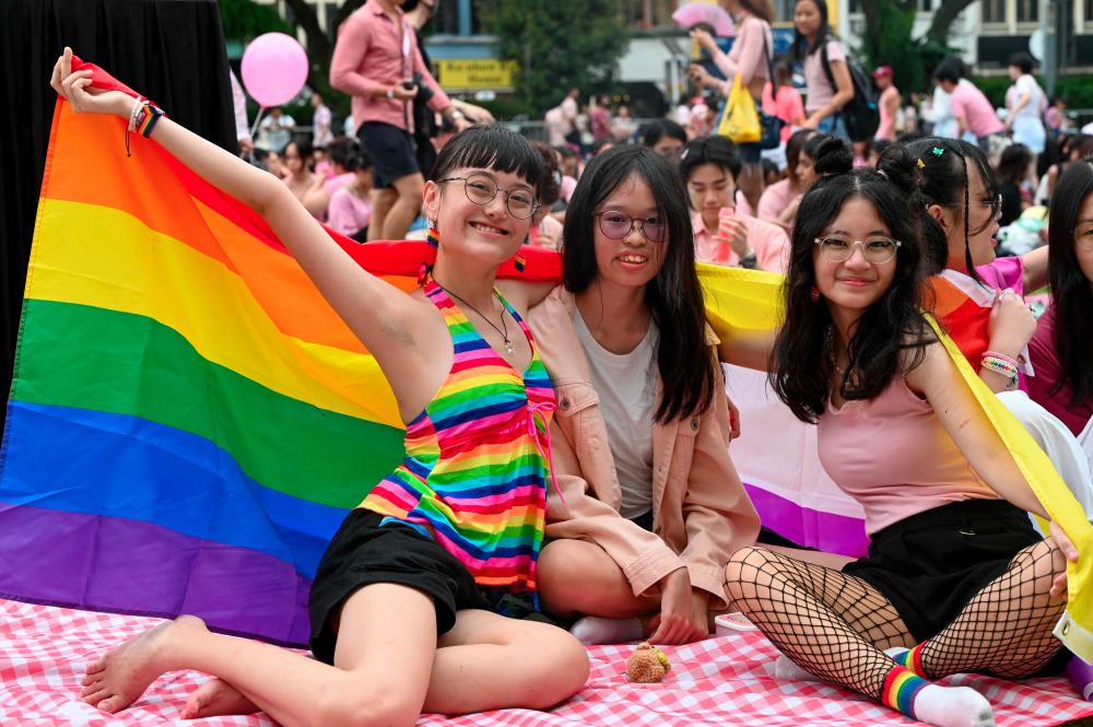 Supporters attend the annual Pink Dot event in a public show of support for the LGBTQ community at Hong Lim Park in Singapore on June 24, 2023. - AFPPIX
