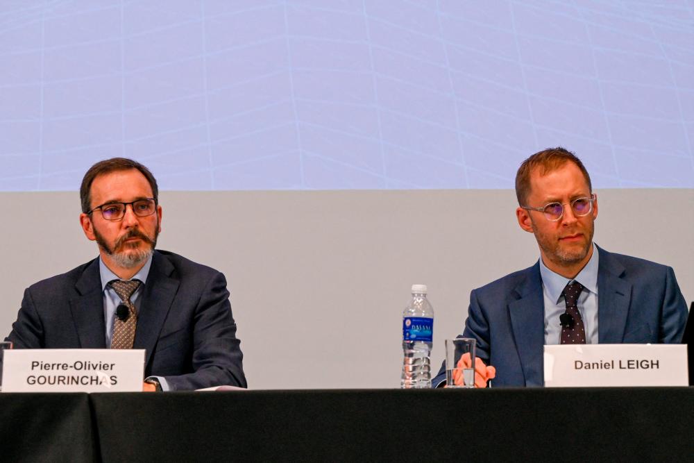 Gourinchas and Leigh at a press briefing for the World Economy Outlook update in Singapore on Tuesday. – AFPpic