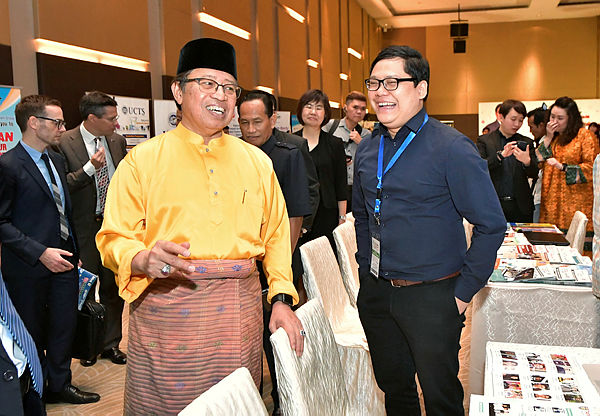 Sarawak Chief Minister Datuk Patinggi Abang Johari Tun Openg during a visit to a higher education exhibition booth at New Zealand at the opening of the Sin Chew Education Fair 2019 on March 8, 2019. — Bernama
