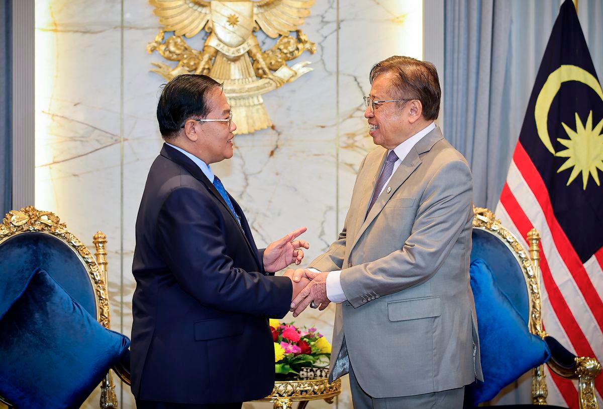 Sarawak Premier Tan Sri Abang Johari Tun Openg receives a courtesy call from Cambodia’s Senior Minister for Special Mission Neak Oknha Datuk Dr Othsman Hassan (left) at his office in the Satria Pertiwi Complex, Petra Jaya, today. – BERNAMA