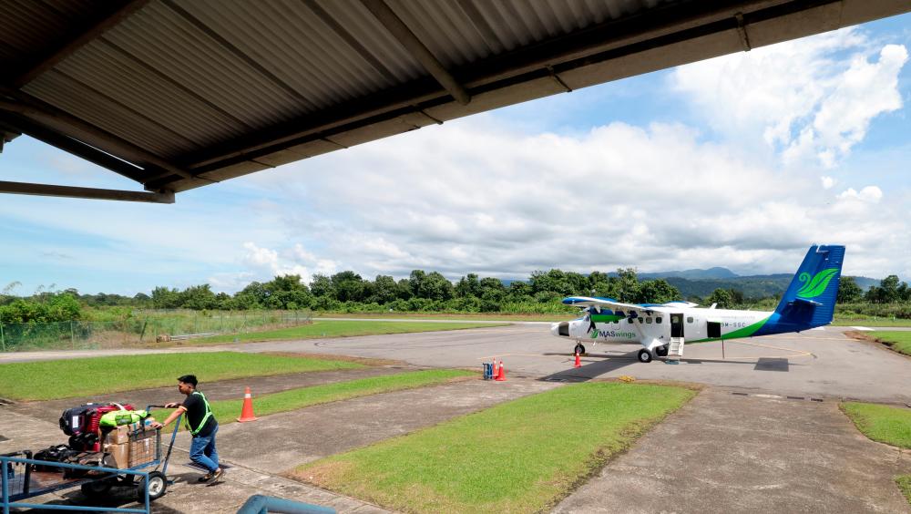 The Twin-Otter small airplane at the Lawas Airport located in Sarawak’s northern region. - BERNAMAPIX