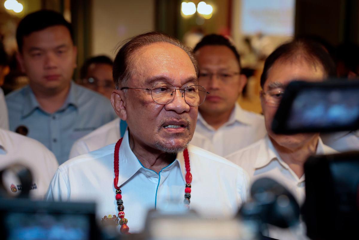 Prime Minister Datuk Seri Anwar Ibrahim speaking at a press conference after a meeting with the Sarawak Parti Keadilan Rakyat (PKR) State Leadership Council (MPN) at a hotel - BERNAMAPIX