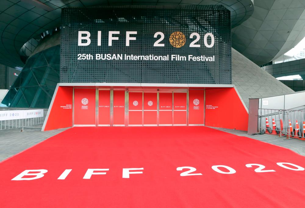 Signs of the Busan International Film Festival are seen at an entrance of the Busan Cinema Center in Busan on October 21, 2020. / AFP / YONHAP / - / REPUBLIC OF KOREA OUT