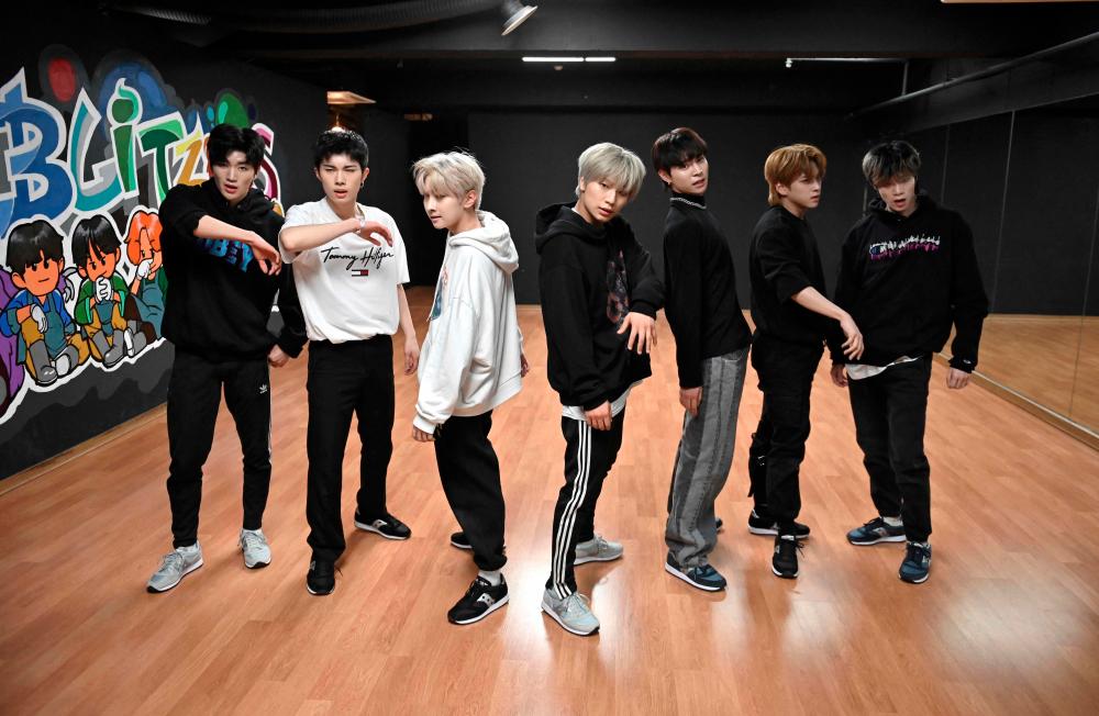 This picture taken on April 29, 2021 shows members of the K-pop boy band Blitzers performing during their dance practise session at a rehearsal studio in Seoul. - AFP