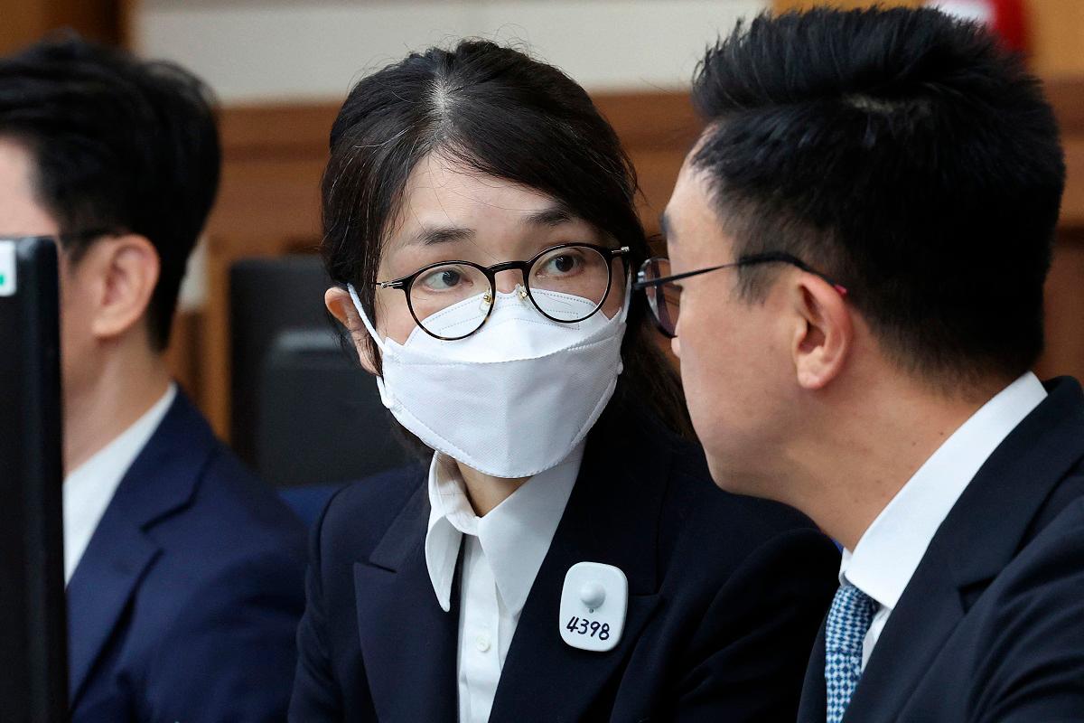 South Korea’s former first lady Kim Keon Hee (C) attends her first trial hearing on corruption charges at the Seoul Central District Court in Seoul on September 24, 2025. - Chung Sung-Jun / POOL / AFP