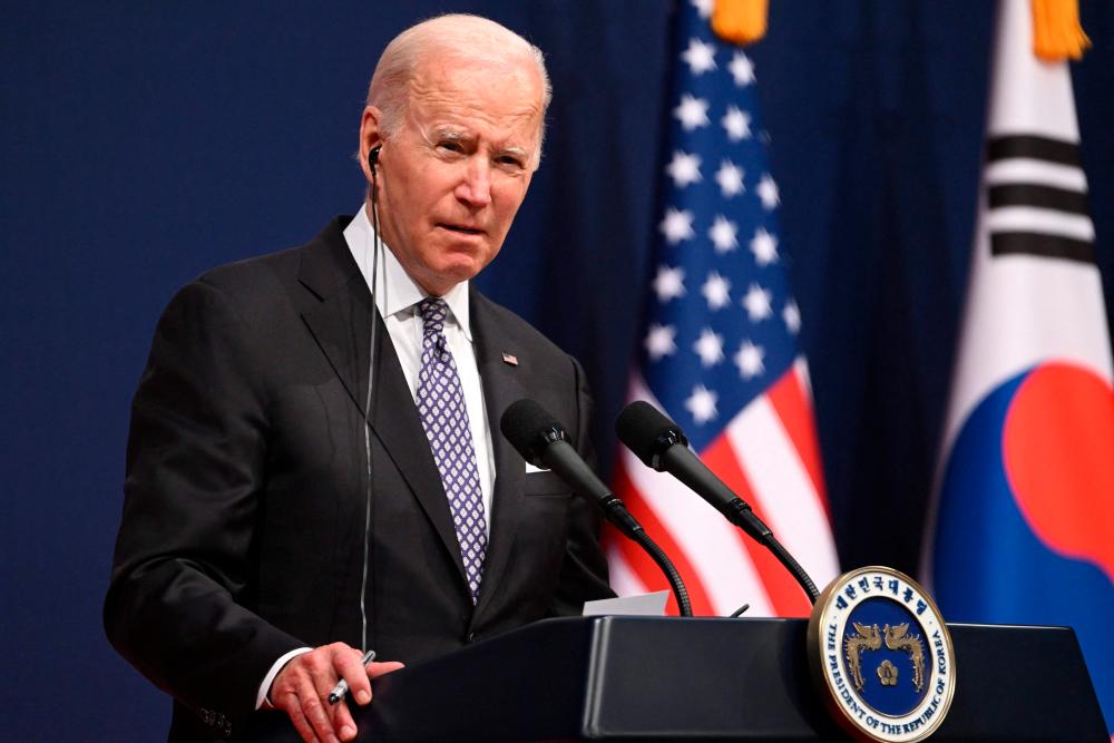 US President Joe Biden speaks during a joing press conference with South Korean President Yoon Suk-yeol (not pictured) at the People’s House in Seoul on May 21, 2022. AFPPIX