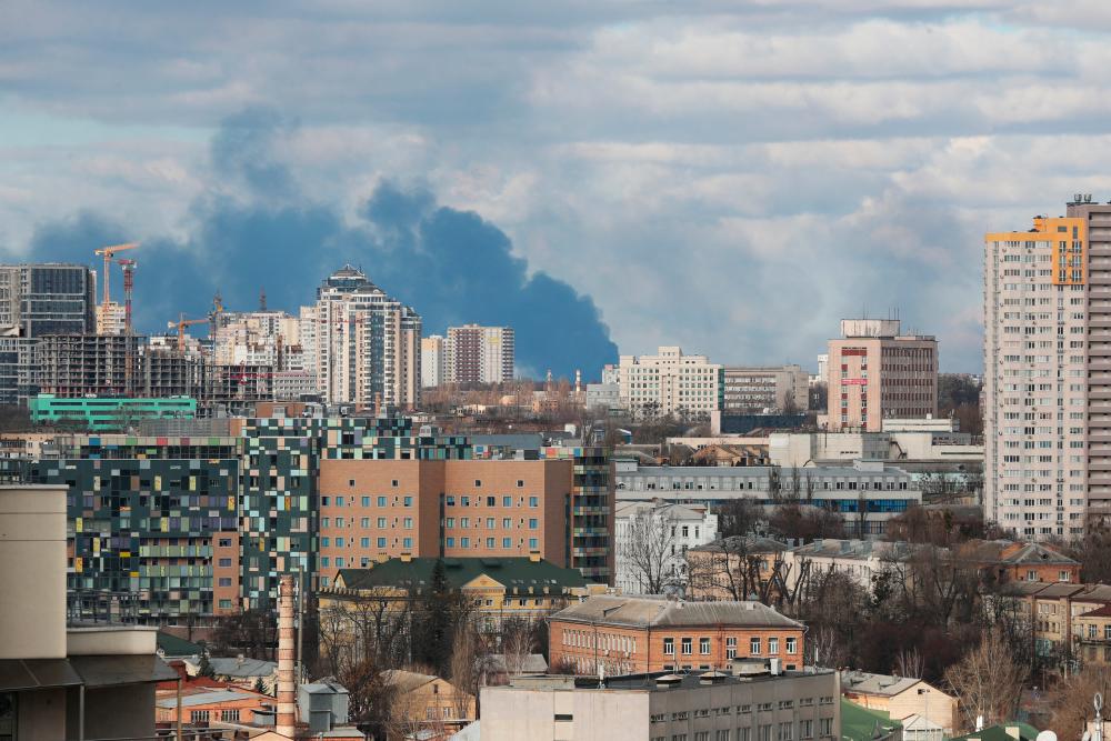 Smoke rising after shelling on the outskirts of the city is pictured from central Kyiv, Ukraine/REUTERSPix