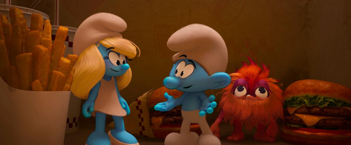 (From left) Smurfette (Rihanna), No Name Smurf (Corden) and Mama Poot (Lyonne) team up for a giggle-filled quest across worlds.