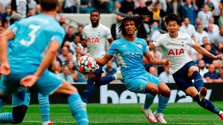 Tottenham Hotspur’s Son Heung-Min (right) scores the opening goal during the English Premier League match against Manchester City at Tottenham Hotspur Stadium on Sunday. – AFPPIX