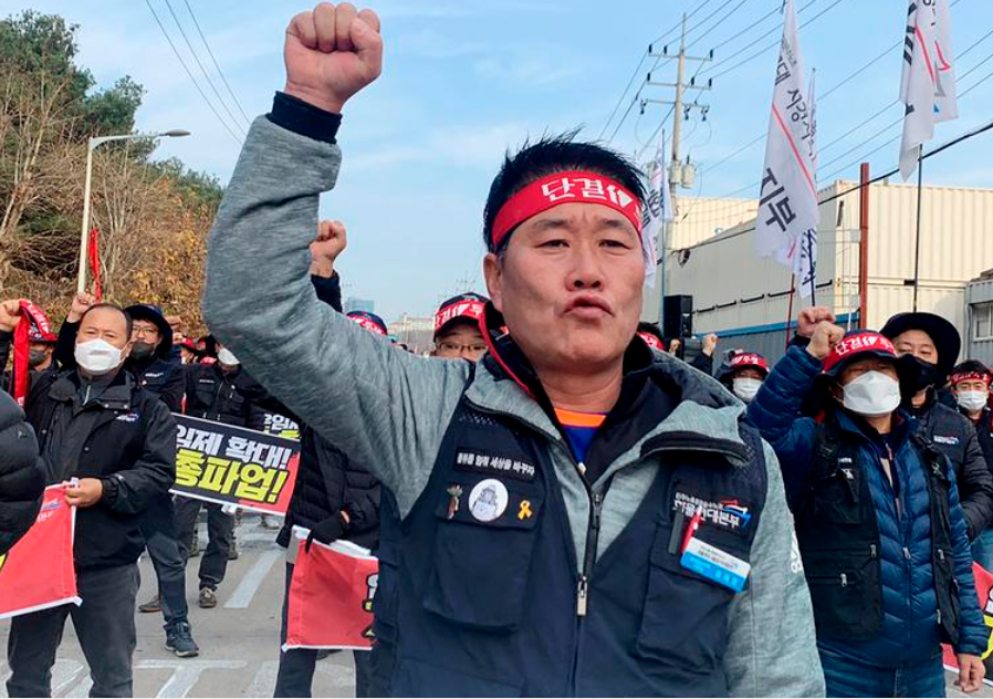 FILE PHOTO: Unionized truckers shout slogans during their rally as they kick off their strike in front of transport hub Uiwang, south of Seoul, South Korea November 24, 2022. REUTERSPIX