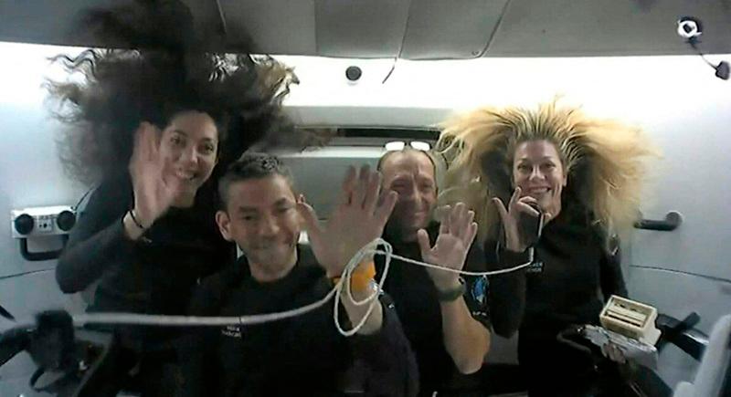 This still image taken from the Polaris Dawn crew on September 13, 2024, shows the SpaceX Polaris Dawn crew Jared Isaacman, Mission Commander, Anna Menon, Mission Specialist and Medical Officer, Sarah Gillis, Mission Specialist, and Scott Poteet, Mission pilot, during the SpaceX Polaris Dawn mission. The SpaceX Polaris Dawn mission, which made history when its crew conducted the first ever spacewalk by non-government astronauts, is preparing for splashdown off the coast of Florida on September 15, 2024. - AFP PHOTO / SpaceX / Polaris