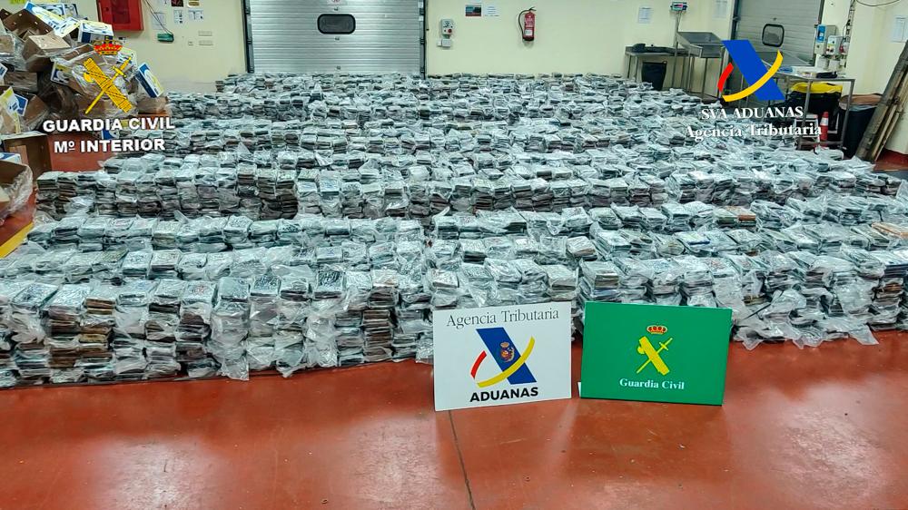 This handout picture released on November 30, 2022 by the Spanish Guardia Civil shows piles of plastic-wrapped bricks of cocaine after a drug seizure in the port of Valencia. Spanish authorities said on November 30 they had seized 5.6 tonnes of cocaine worth over 340 million euros in the port of Valencia, in the nation’s biggest haul of the drug in four years/AFPPix