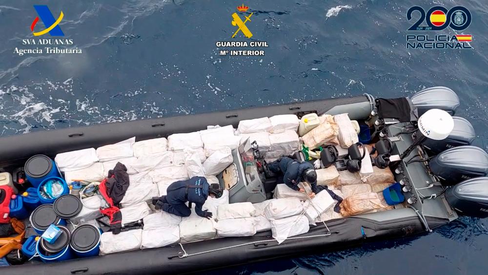 This handout image released on February 15, 2024 by Spanish Guardia Civil shows a speedboat, carrying over four tonnes of cocaine, which was seized by Spanish police off the Canary Islands/AFPPix