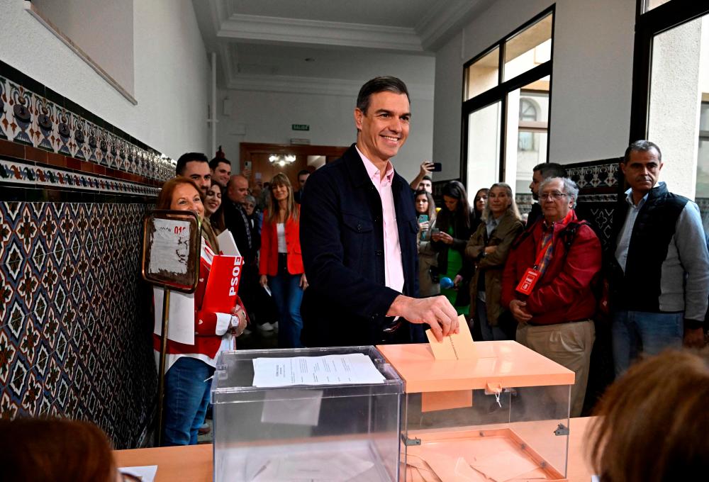 Spain’s Prime minister Pedro Sanchez of Socialist Party (PSOE) casts his ballot in Madrid on May 28, 2023 during local and regional polls. Spain’s local and regional elections results will be a barometer for a year-end general election, that surveys suggest Prime Minister will lose, heralding a return of the right/AFPPix