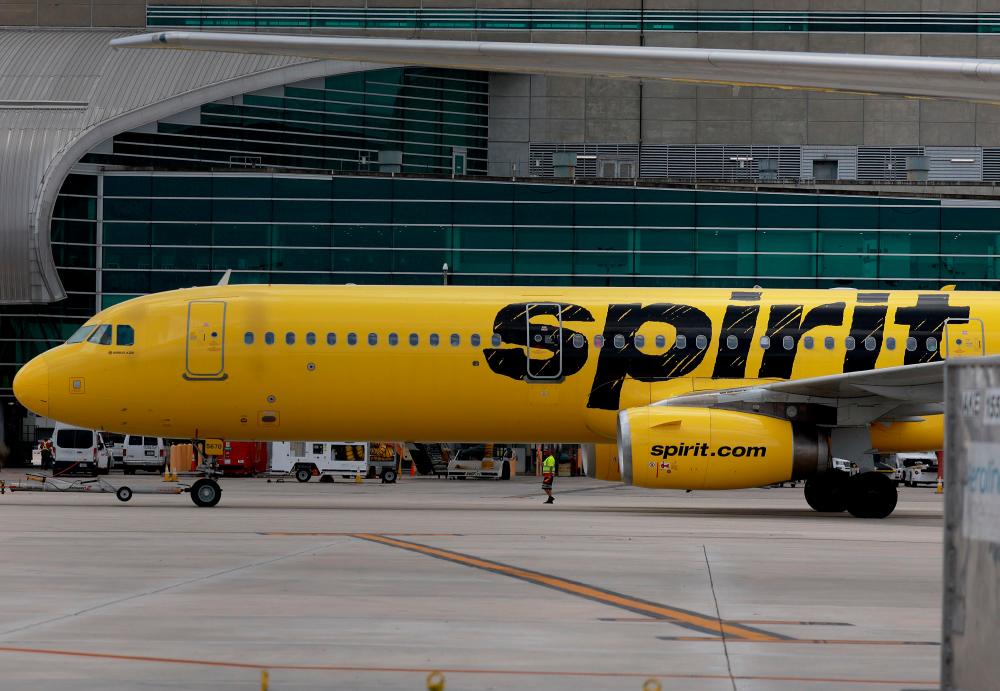 A Spirit Airlines plane at Miami International Airport on Wednesday. The JetBlue-Spirit merger will create the fifth largest US airline. – AFPpix