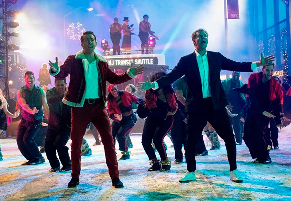 Ryan Reynolds (left) and Will Ferrell in a scene from the musical. – IMDB