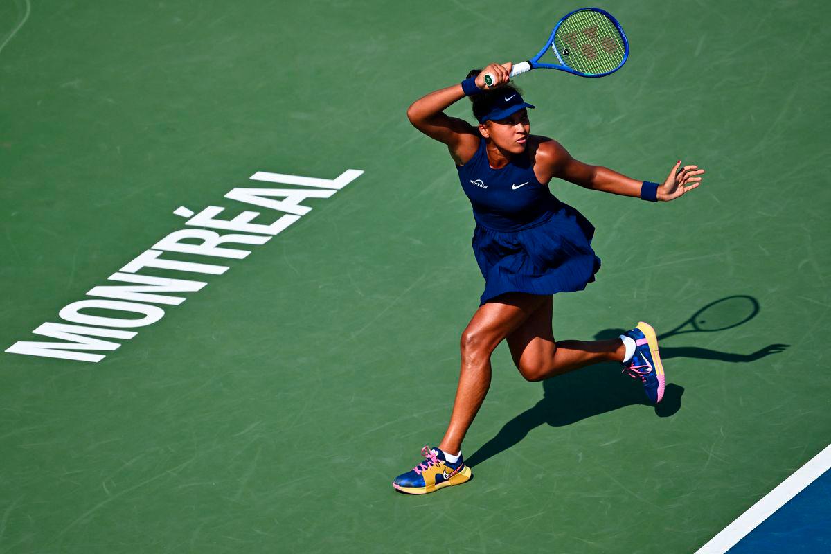 Naomi Osaka of Japan plays a forehand against Ariana Arseneault of Canada during their first round match on Day Two of the WTA 1000 National Bank Open at IGA Stadium on July 28, 2025 in Montreal, Quebec, Canada. - AFPPIX