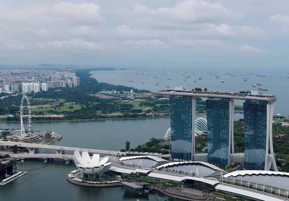 A view of the vessels anchored in the eastern anchorage area, seen behind the Marina Bay Sands integrated resort in Singapore July 26, 2022. REUTERSPIX