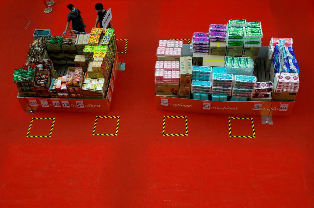 Instant noodles and toilet rolls are displayed for sale at a mall amid the coronavirus disease outbreak in Singapore today. – REUTERSPIX