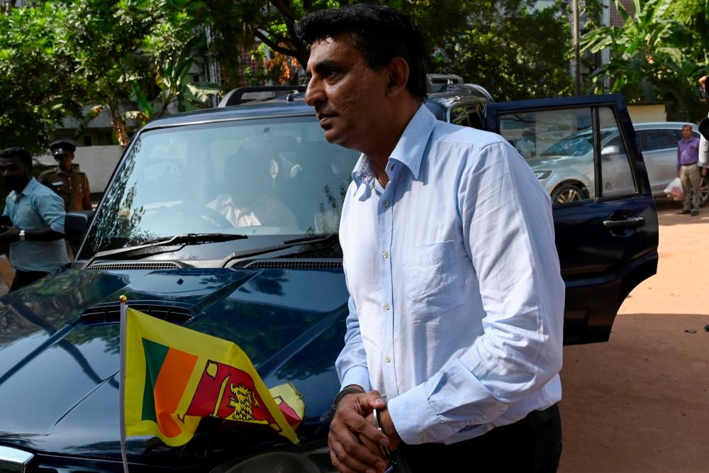 Former SriLankan Airlines CEO Kapila Chandrasena arrives at the Magistrate's Court following his arrest, in Colombo on February 6, 2020. - AFP