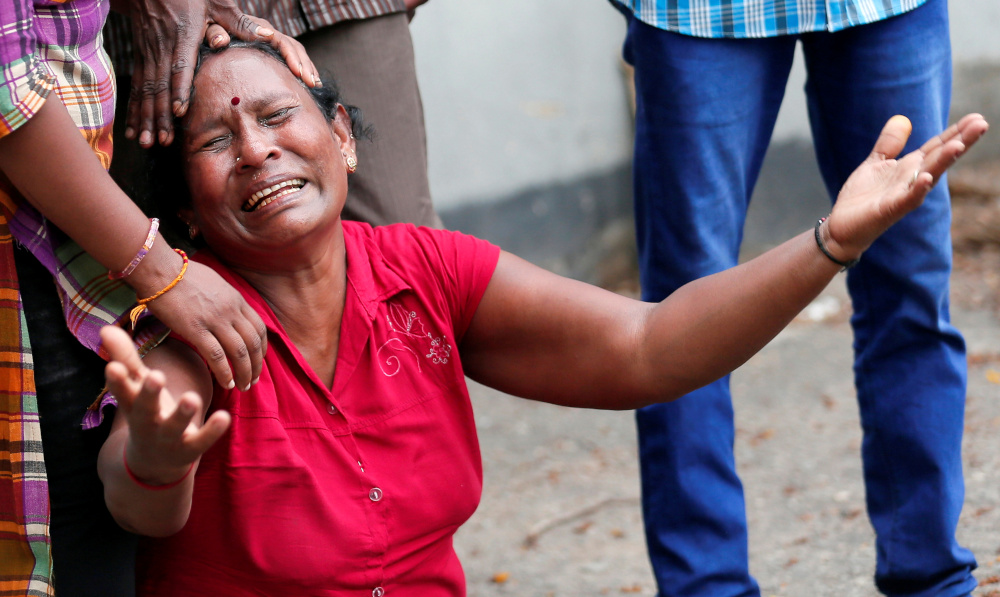A relative of a victim of the explosion at St Anthony’s Shrine, Kochchikade church, reacts at the police mortuary in Colombo, Sri Lanka on April 21, 2019. — Reuters