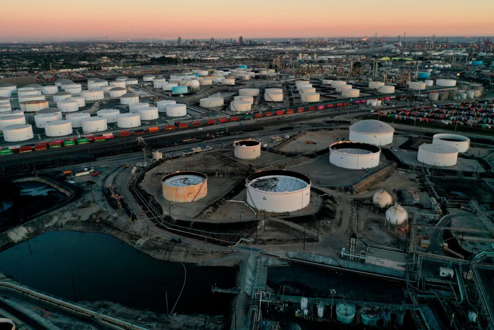 Storage tanks for crude oil, petrol, diesel and other refined petroleum products are seen at the Kinder Morgan Terminal in Carson, California. The White House says the US president will continue to assess whether to release more supplies from the Strategic Petroleum Reserve. – Reuterspic