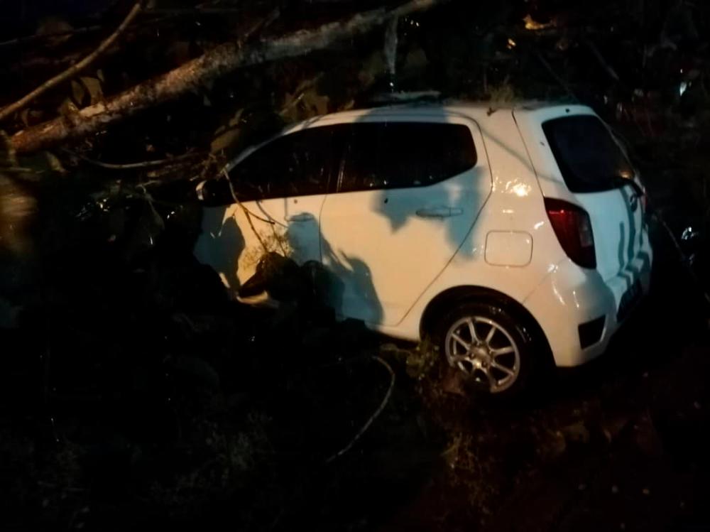 A car that was damaged following a storm that swept through Langkawi, on Aug 9, 2019.
