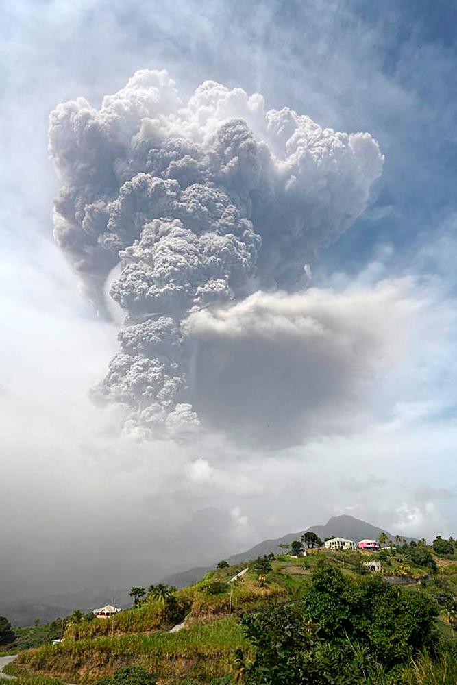 This handout image courtesy of the St. Vincent Seismic Center released on April 9, 2021, shows the eruption of La Soufriere Volcano from Rillan Hill in Saint Vincent. –AFP